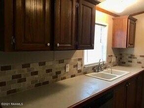 446 Chemin Metairie Rd in Youngsville, LA - Building Photo - Building Photo