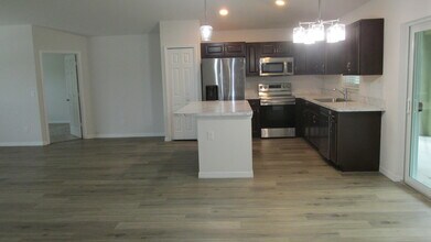 1726 SE Minorca Ave in Port St. Lucie, FL - Building Photo - Building Photo