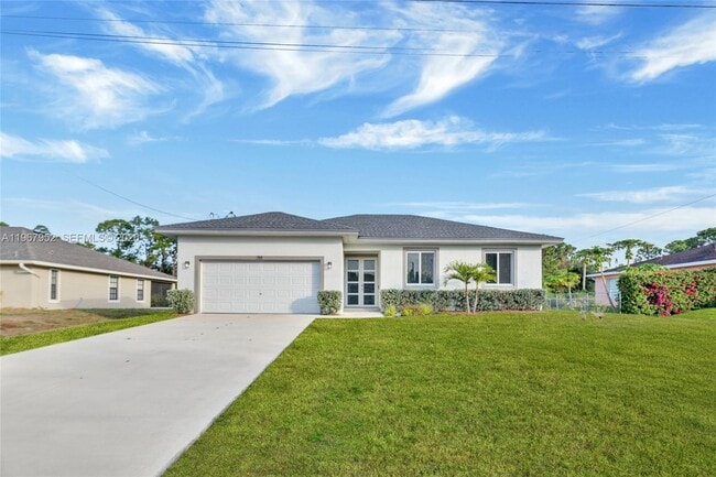 719 Little Rock St E in Lehigh Acres, FL - Building Photo - Building Photo