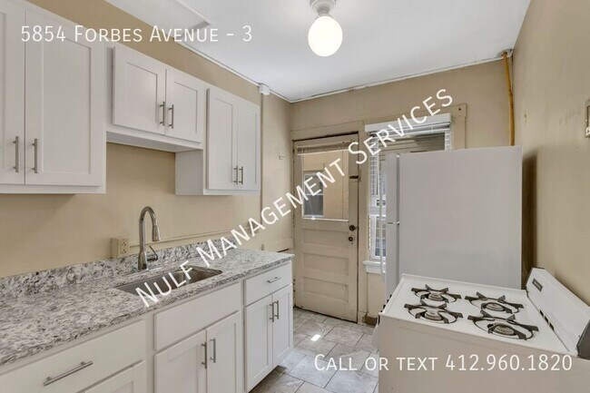 property at 5854 Forbes Ave