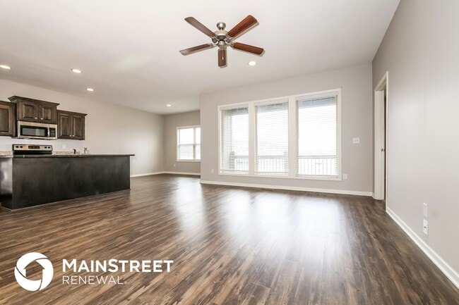 209 NE Kim Ct, Unit 54 in Grain Valley, MO - Foto de edificio - Building Photo