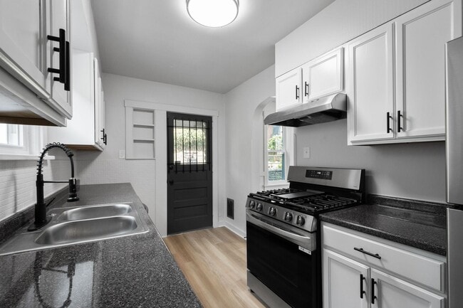 property at 1303 Woodlawn Ave