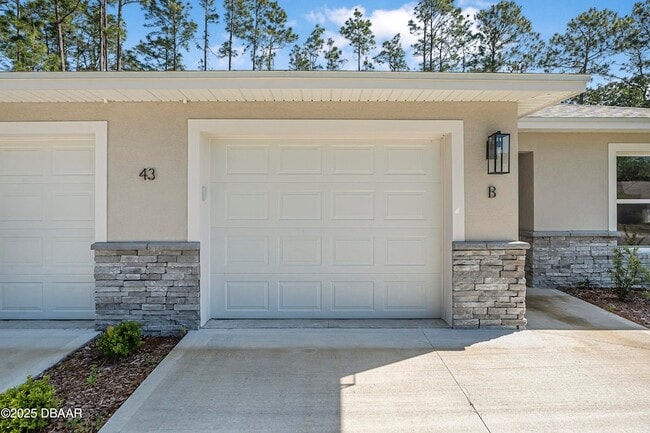 43 Pony Express Dr in Palm Coast, FL - Foto de edificio - Building Photo