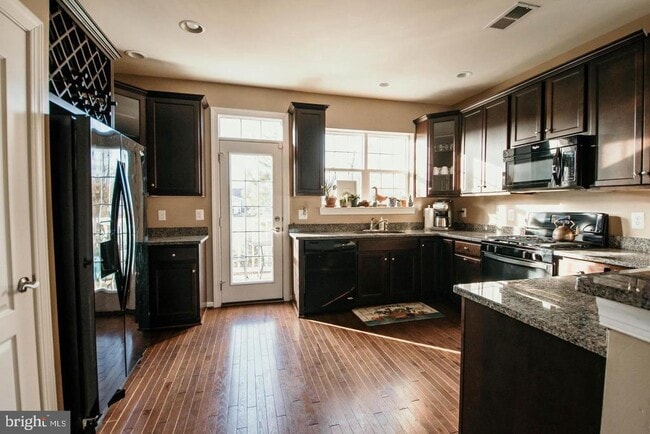 7454 Riding Meadow Way in Manassas, VA - Building Photo - Building Photo