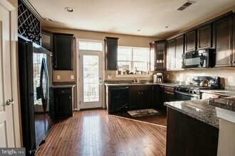 7454 Riding Meadow Way in Manassas, VA - Building Photo - Building Photo