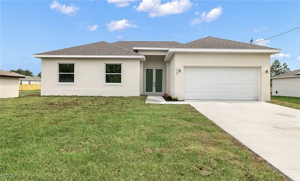 4103 Nora Ave S in Lehigh Acres, FL - Building Photo