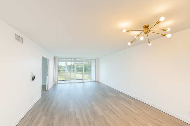property at 4030 W Palm Aire Dr