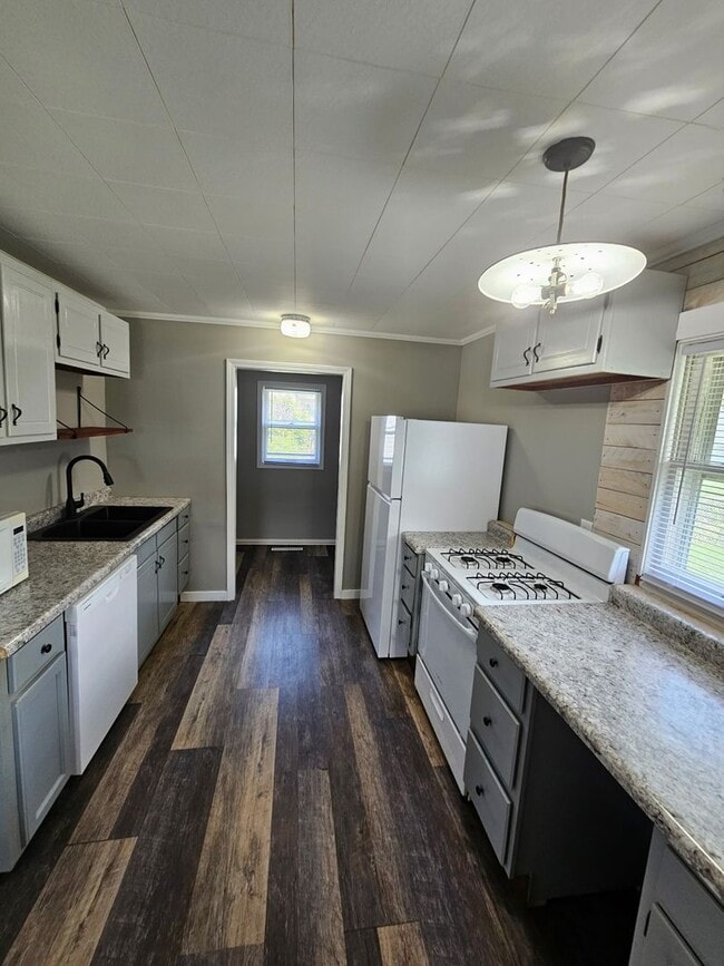 property at 106 E 3rd St