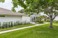 10304 Chapman Oak Ct in Palm Beach Gardens, FL - Foto de edificio - Building Photo