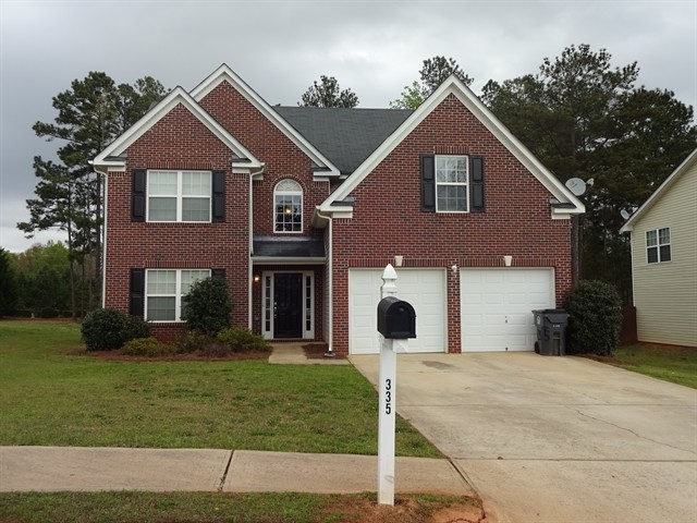 335 Cobblestone Ct in Hampton, GA - Building Photo