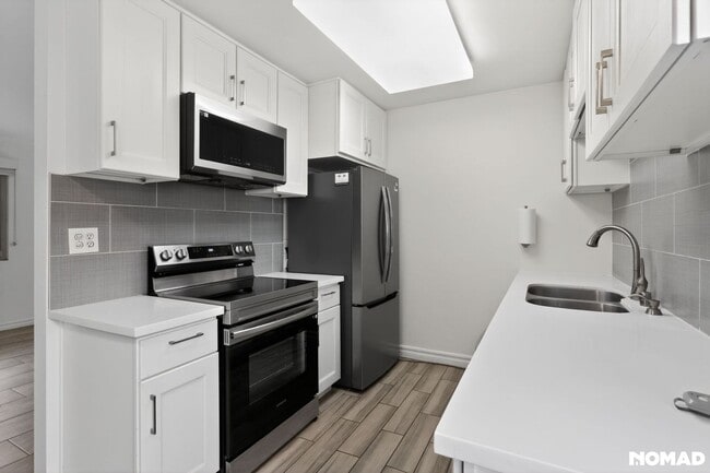 property at 8650 Belford Ave