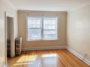 1605 W Sunnyside Ave, Unit 1W in Chicago, IL - Foto de edificio - Building Photo