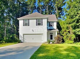 1009 Theodore Rd in Awendaw, SC - Building Photo