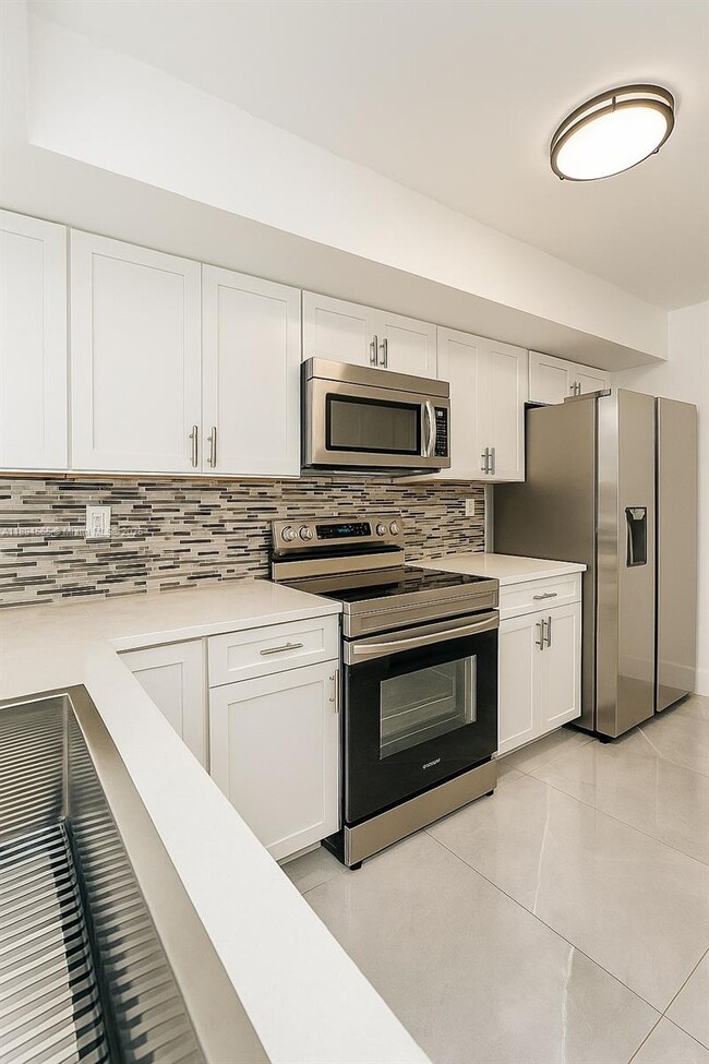 8680 SW 212th St in Cutler Bay, FL - Building Photo - Building Photo