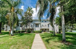 7246 E Bank Dr, Unit Water front condo in Tampa, FL - Building Photo