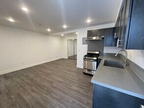 210 W 57th St, Unit 3/4 in Los Angeles, CA - Foto de edificio - Building Photo