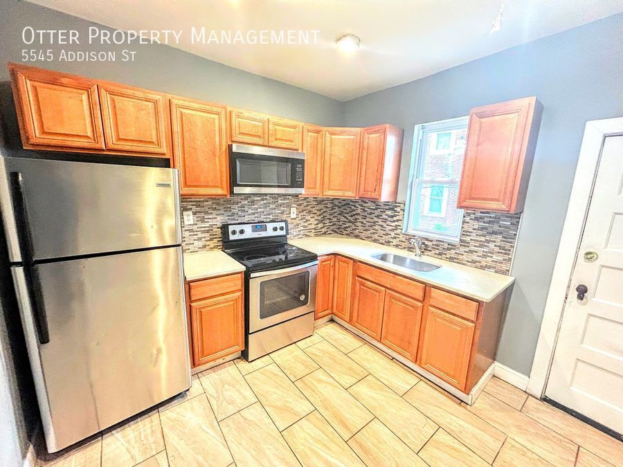 5545 Addison St in Philadelphia, PA - Building Photo