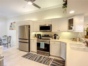 14530 Red Fox Run-Unit -215 in Naples, FL - Building Photo - Building Photo