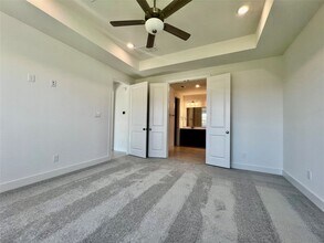 10602 Blossom River Dr in Sienna, TX - Building Photo - Building Photo