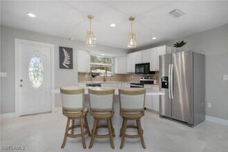 27 Pebble Beach Blvd in Naples, FL - Building Photo - Building Photo