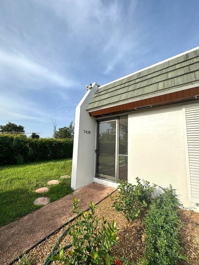 property at 7439 Twin Sabal Dr