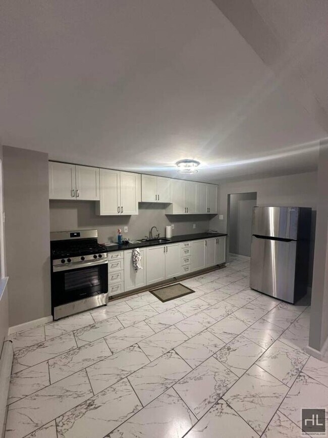 312 Meacham Ave in Elmont, NY - Building Photo - Building Photo