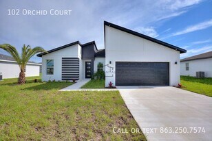 102 Orchid Ct in Poinciana, FL - Building Photo