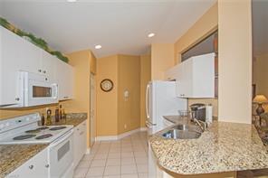 720 Tarpon Cove Dr-Unit -2-203 in Naples, FL - Building Photo - Building Photo