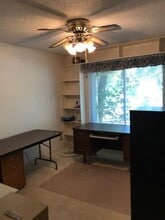8727 Tallwood Dr in Austin, TX - Building Photo - Building Photo