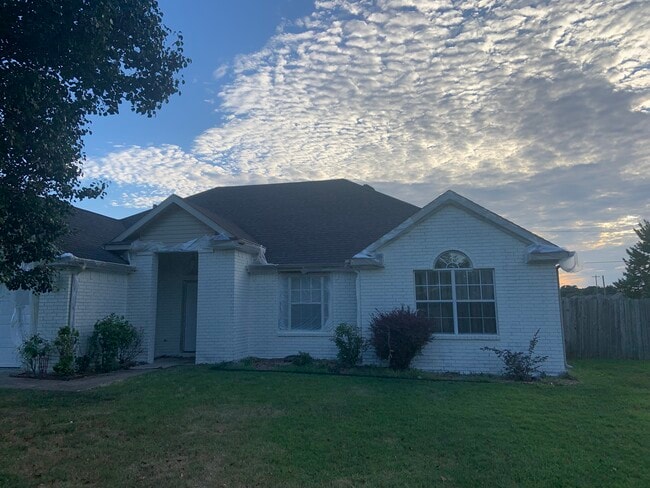 property at 122 NW Apple Blossom