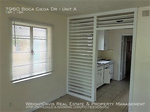 7960 Boca Ciega Dr-Unit -Unit A in St Pete Beach, FL - Building Photo - Building Photo