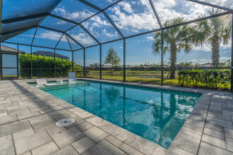 6775 Winding Cypress Dr in Naples, FL - Building Photo - Building Photo