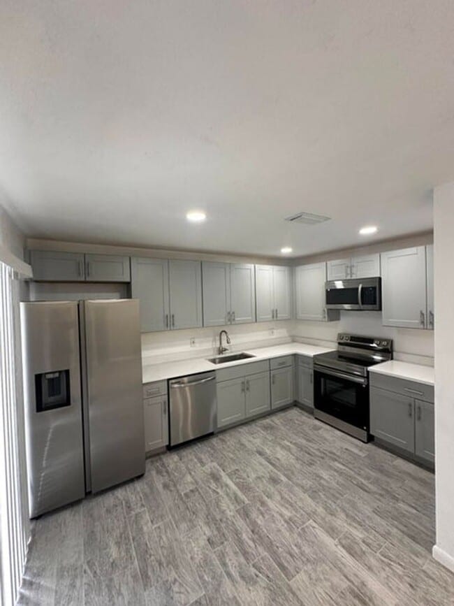 property at 6955 NW 18th St