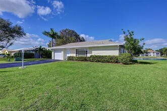 9807 NW 67th Ct in Tamarac, FL - Building Photo - Building Photo