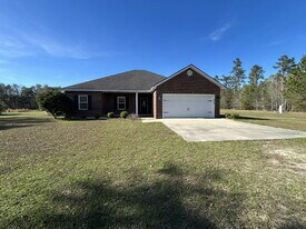 214 Hughes Loop NW in Ludowici, GA - Building Photo