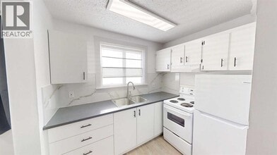 9515-9100 100 Ave. in Grande Prairie, AB - Building Photo - Building Photo