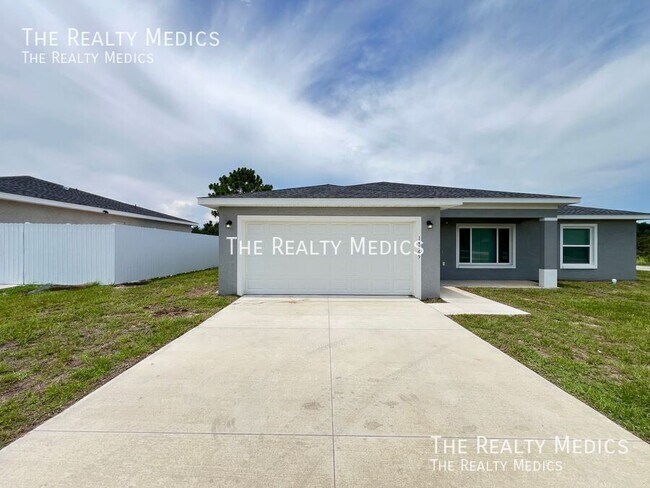 14865 SW 32nd Pl in Ocala, FL - Foto de edificio - Building Photo