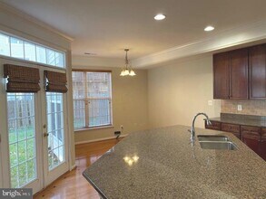 12313 Tanalian Falls Ln in Linton Hall, VA - Building Photo - Building Photo