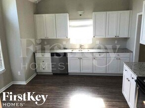 1611 Cooper Dr in Raymore, MO - Building Photo - Building Photo