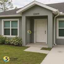 12009 Henley Ave in Port Charlotte, FL - Building Photo