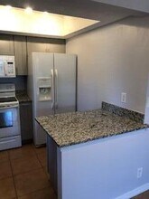 1562 SE Royal Green Cir-Unit -104 in Port St. Lucie, FL - Building Photo - Building Photo