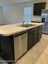 3469 Burrowing Owl Dr in Mims, FL - Building Photo - Building Photo