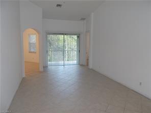 1335 Mariposa Cir-Unit -203 in Naples, FL - Foto de edificio - Building Photo