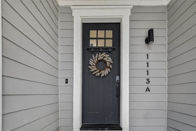 property at 1113 W 15th 1/2 St