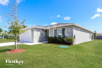 149 NW Curry St in Port St. Lucie, FL - Building Photo - Building Photo