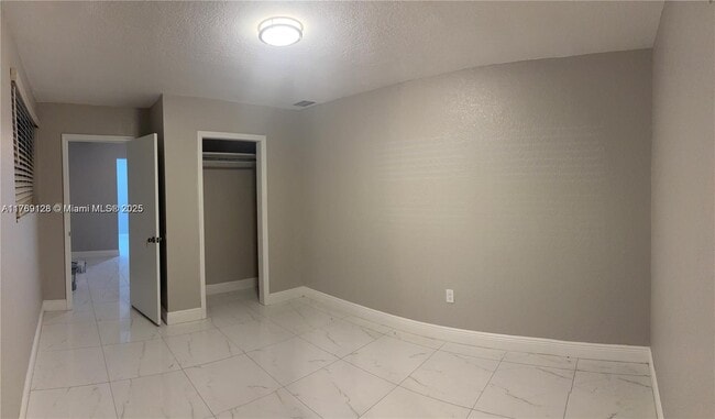 property at 833 NE 153rd St