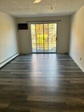 379 Huse Rd, Unit 31 in Manchester, NH - Foto de edificio - Building Photo