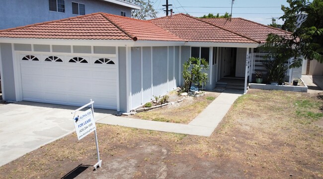 property at 18408 S Denker Ave