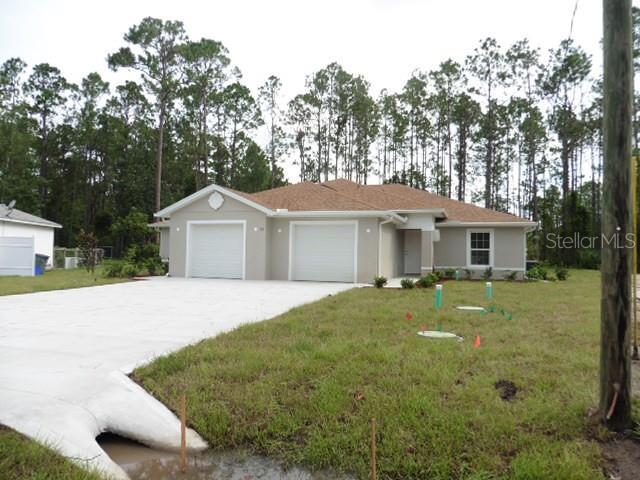 32 Regency Dr in Palm Coast, FL - Building Photo