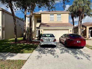 6094 Oak Bluff Way in Greenacres, FL - Foto de edificio - Building Photo